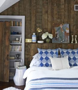 The natural texture of reclaimed wood is a great option for your bedroom remodeling project.